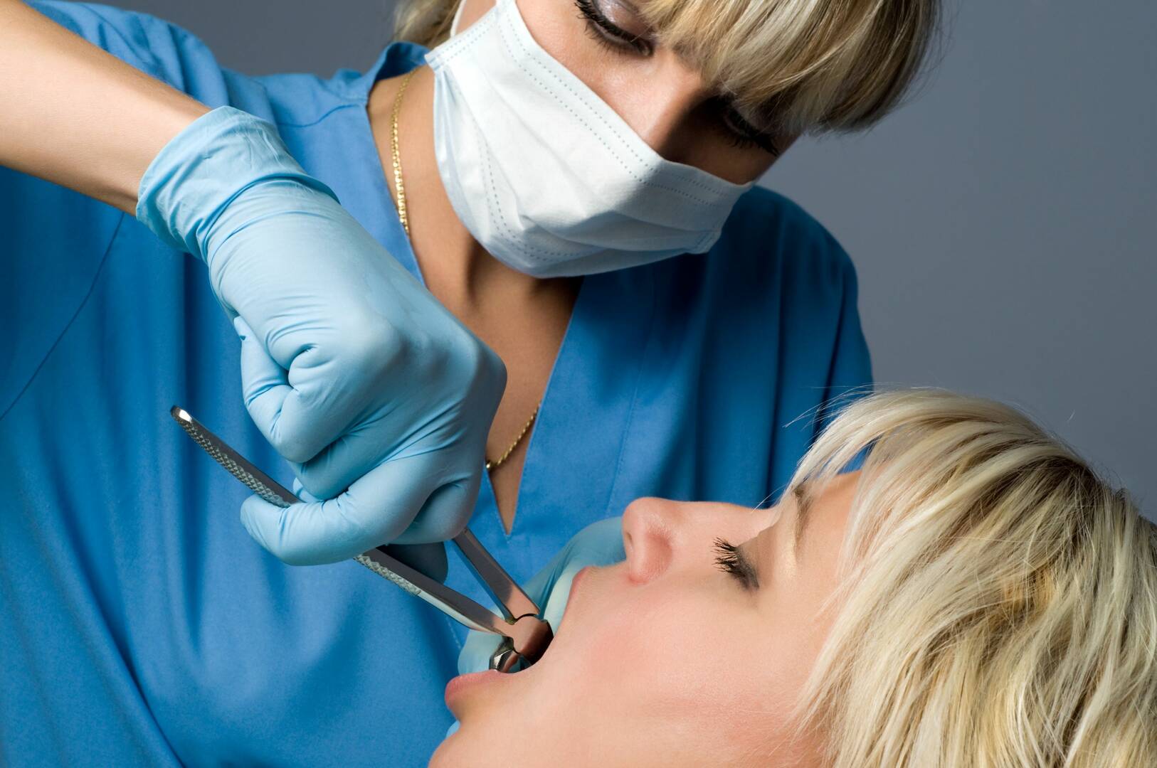Total Denture Care Clinic logo